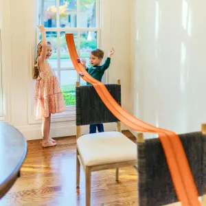 FlexTrack 5000 Orange Track for Toy Cars Flexible Race Track for Kids with Suction Cups Compatible with Hot Wheels Matchbox and Diecast 1/64th Car 15 Feet Long Rolls Up Portable Racetrack