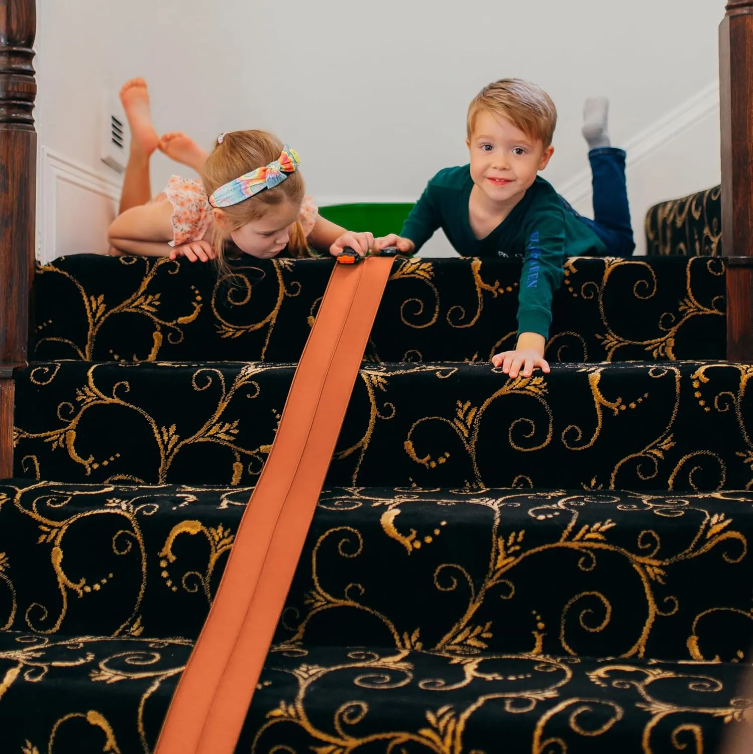 FlexTrack 5000 Orange Track for Toy Cars Flexible Race Track for Kids with Suction Cups Compatible with Hot Wheels Matchbox and Diecast 1/64th Car 15 Feet Long Rolls Up Portable Racetrack